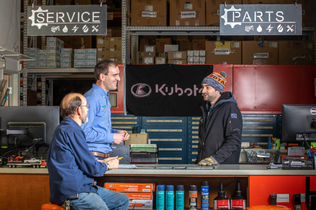 ESI Alaska shop with employee and customer talking