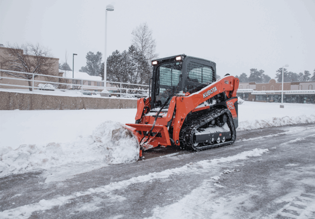 Kubota Skidsteer Kubota Skidsteer plowing snow